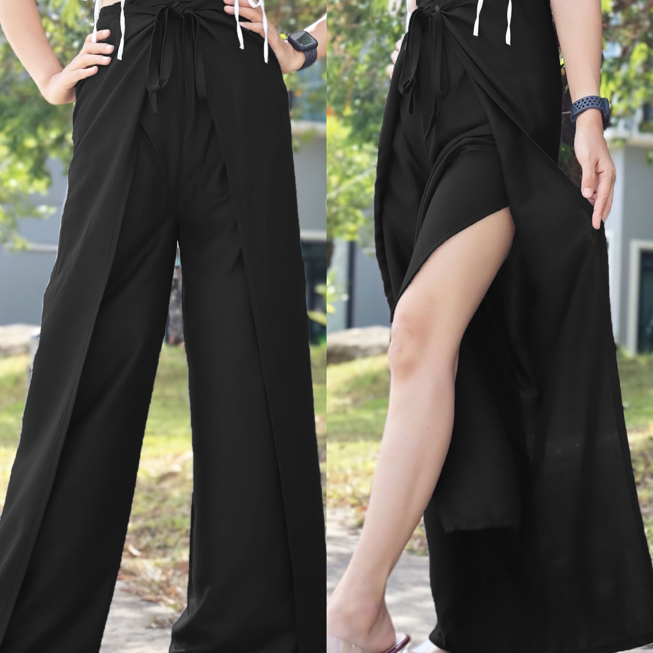 Black boho wrap pants with adjustable waist tie and high side slit, paired with a white lace-up crop top, showcased in an outdoor setting with natural light.