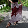 Burgundy Red Boho Wrap Pants with Floral Print in Outdoor Setting