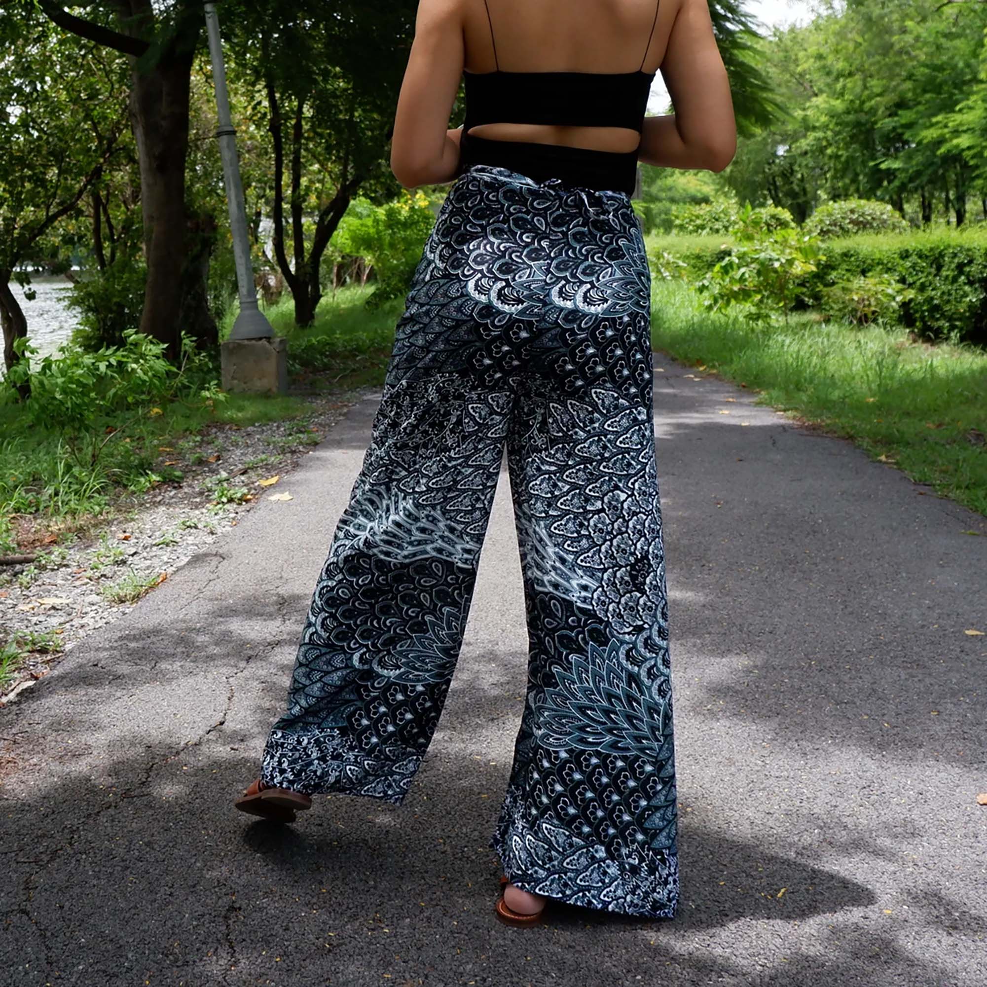 Elegant boho wrap pants with Aegean teal petal print, perfect for a sophisticated and trendy look.