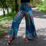 Eye-catching boho wrap pants with a distinctive blue petals print, ideal for a stylish and relaxed look.