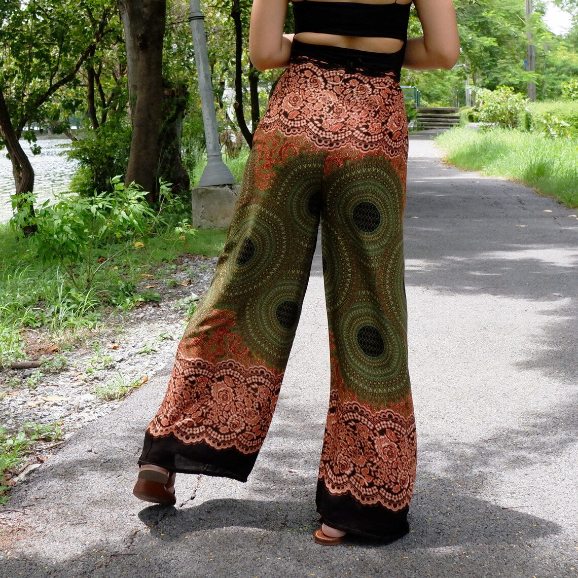 Fashion-forward boho beach wrap pants with detailed patterns, perfect for a summer getaway.