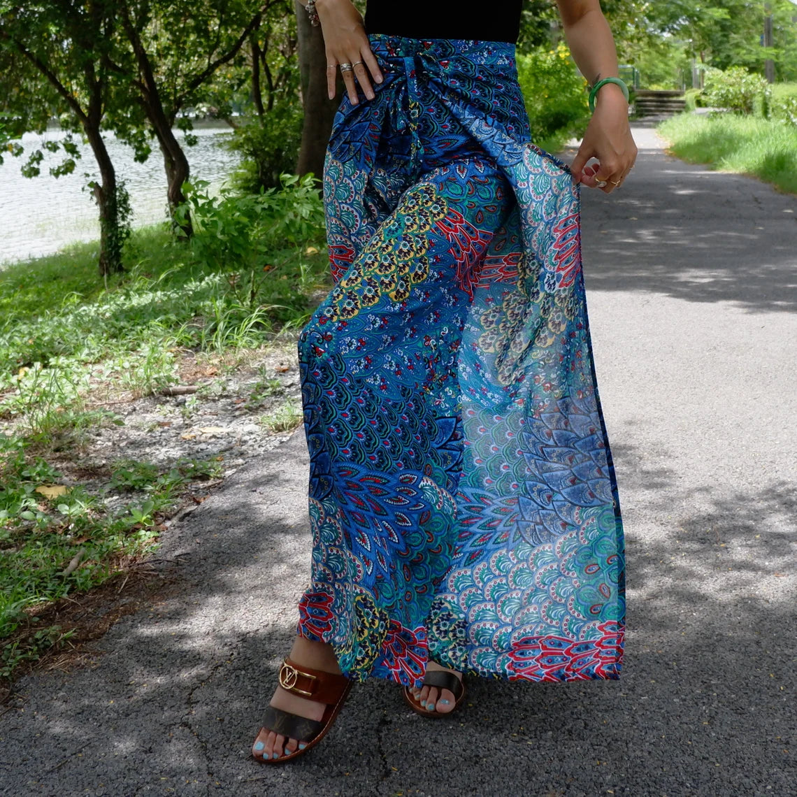 Stunning boho wrap pants with a captivating blue petals print, perfect for a stylish and comfortable look.